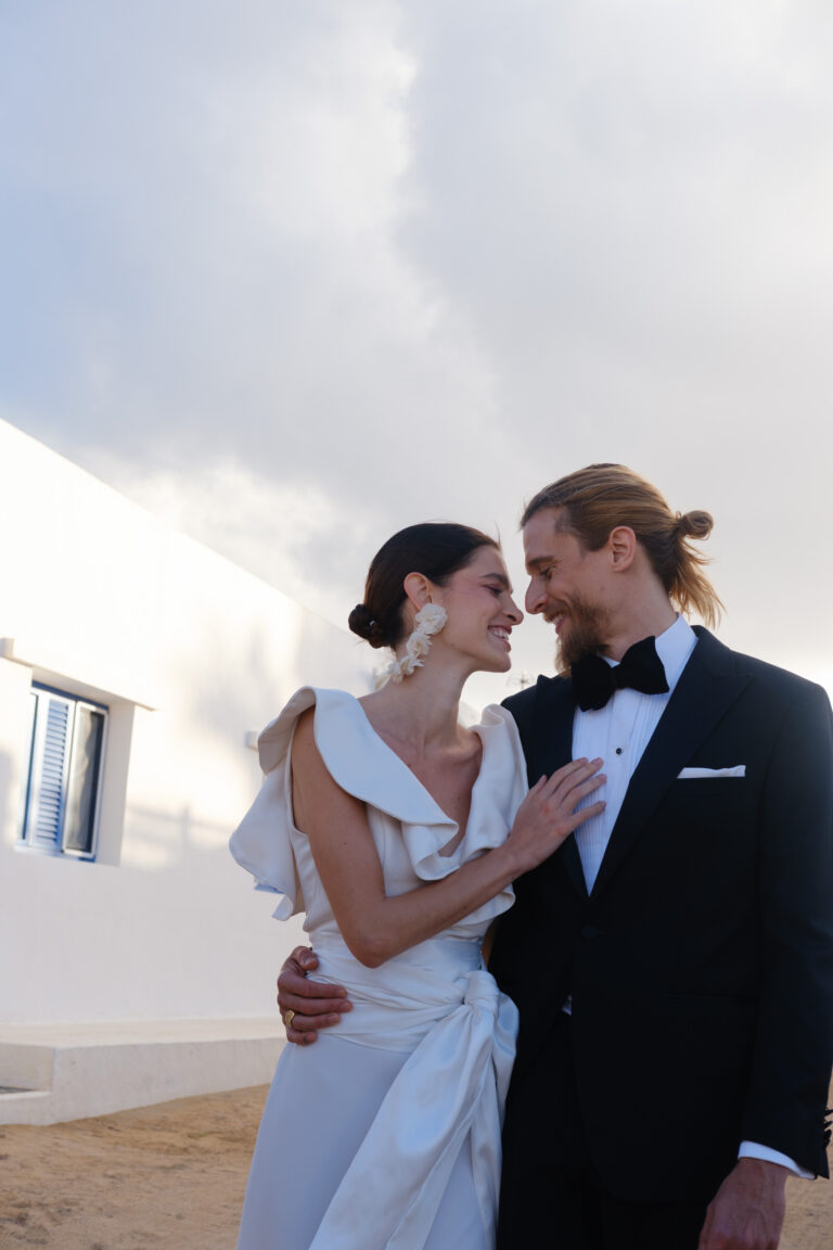 bride & groom looking at each other